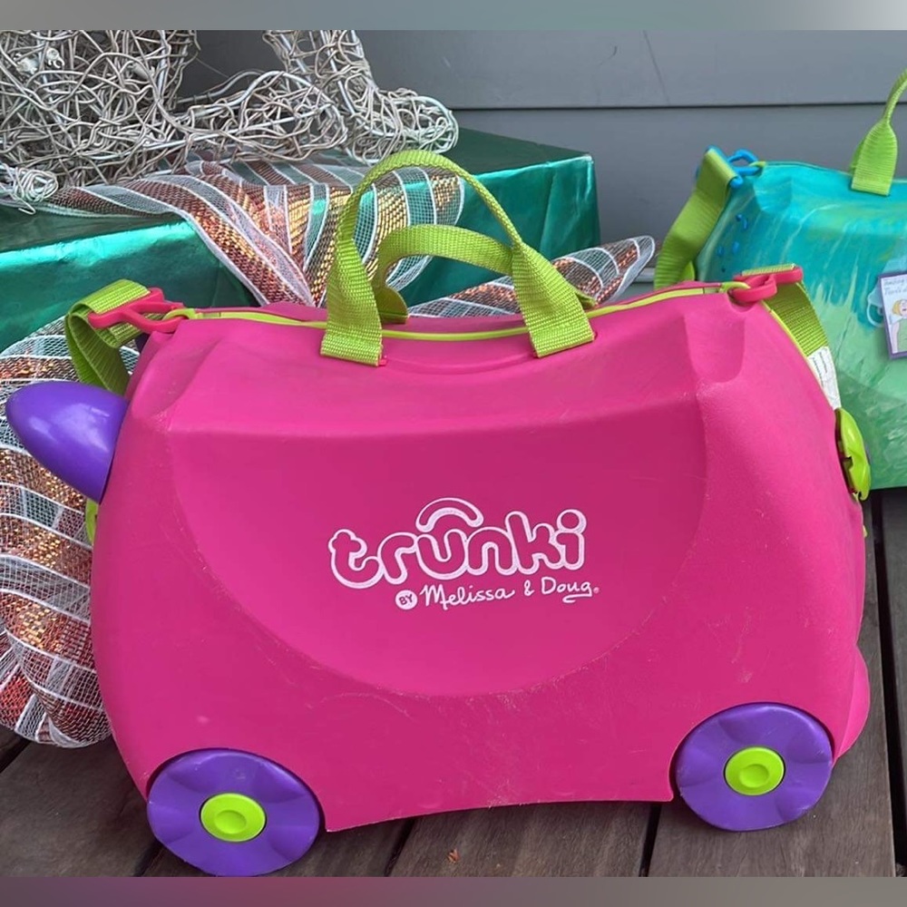 Trunki by Melissa and Doug kids rolling ride on luggage- Pink